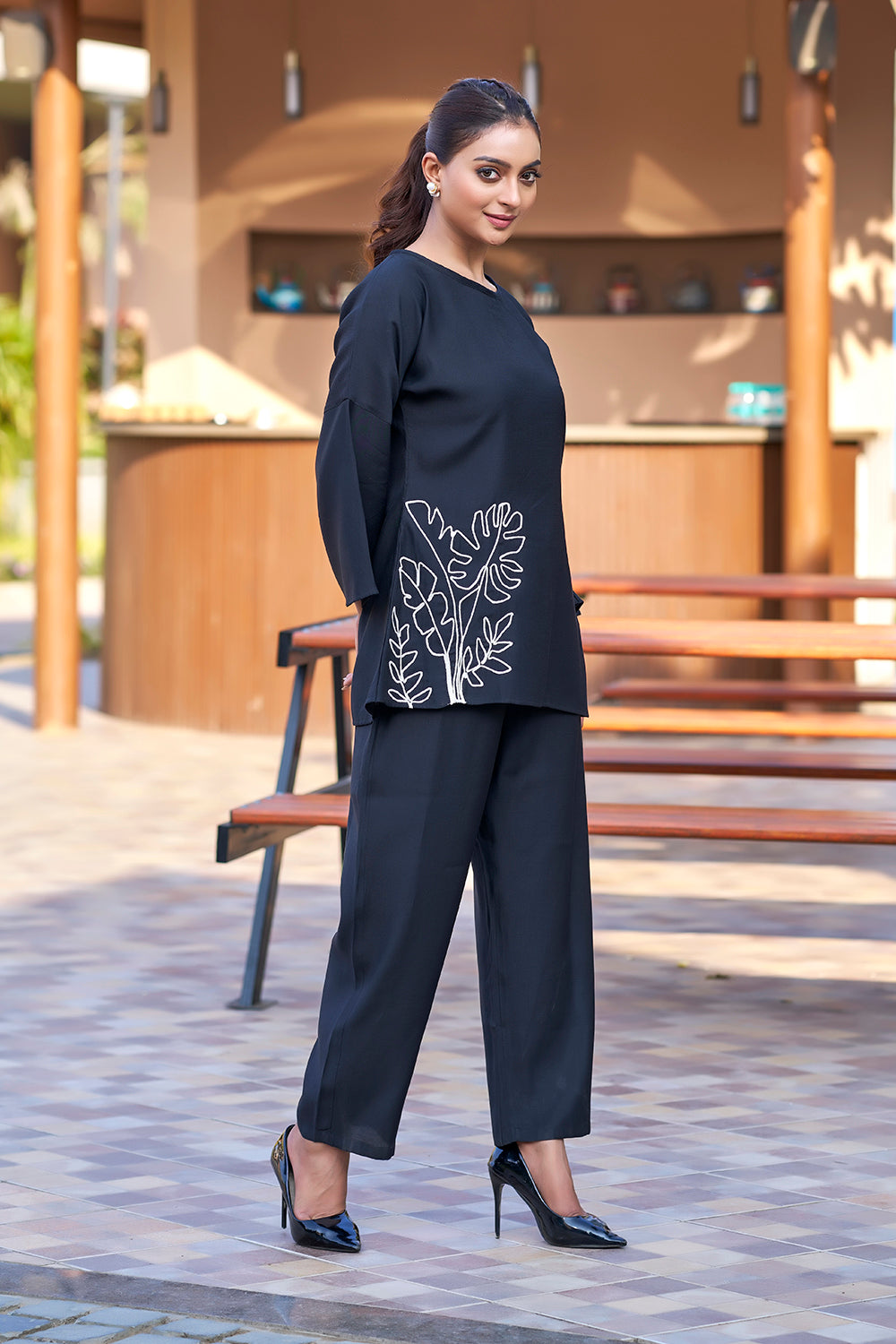 Black designer resort wear co-ord with white floral embroidery work