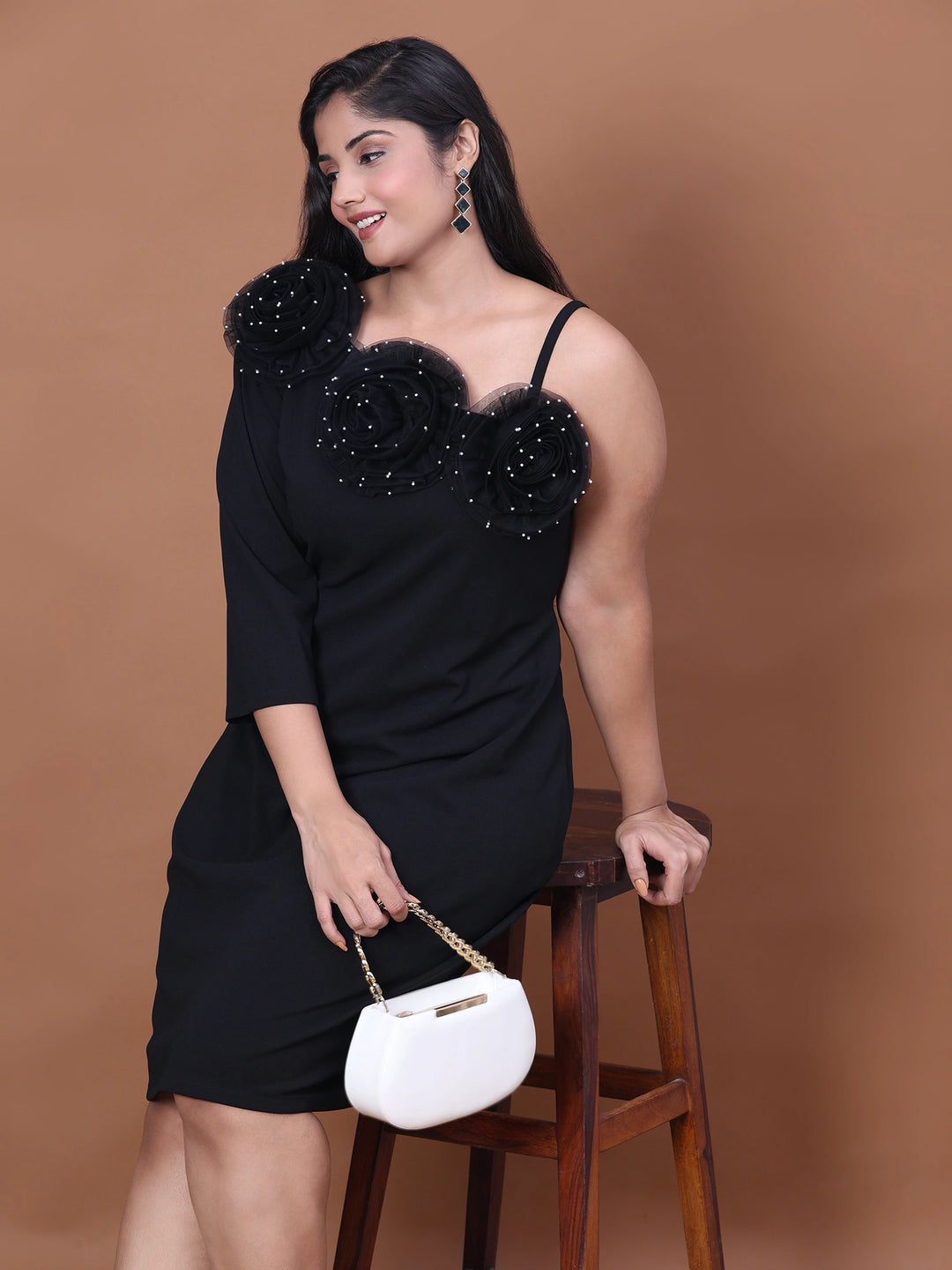 Curve-flattering black on-shoulder party dress