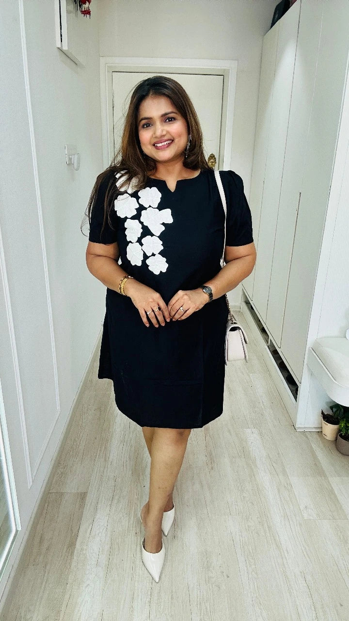 Classic black casual cotton dress with white flowers Classic black casual cotton dress with white flowers