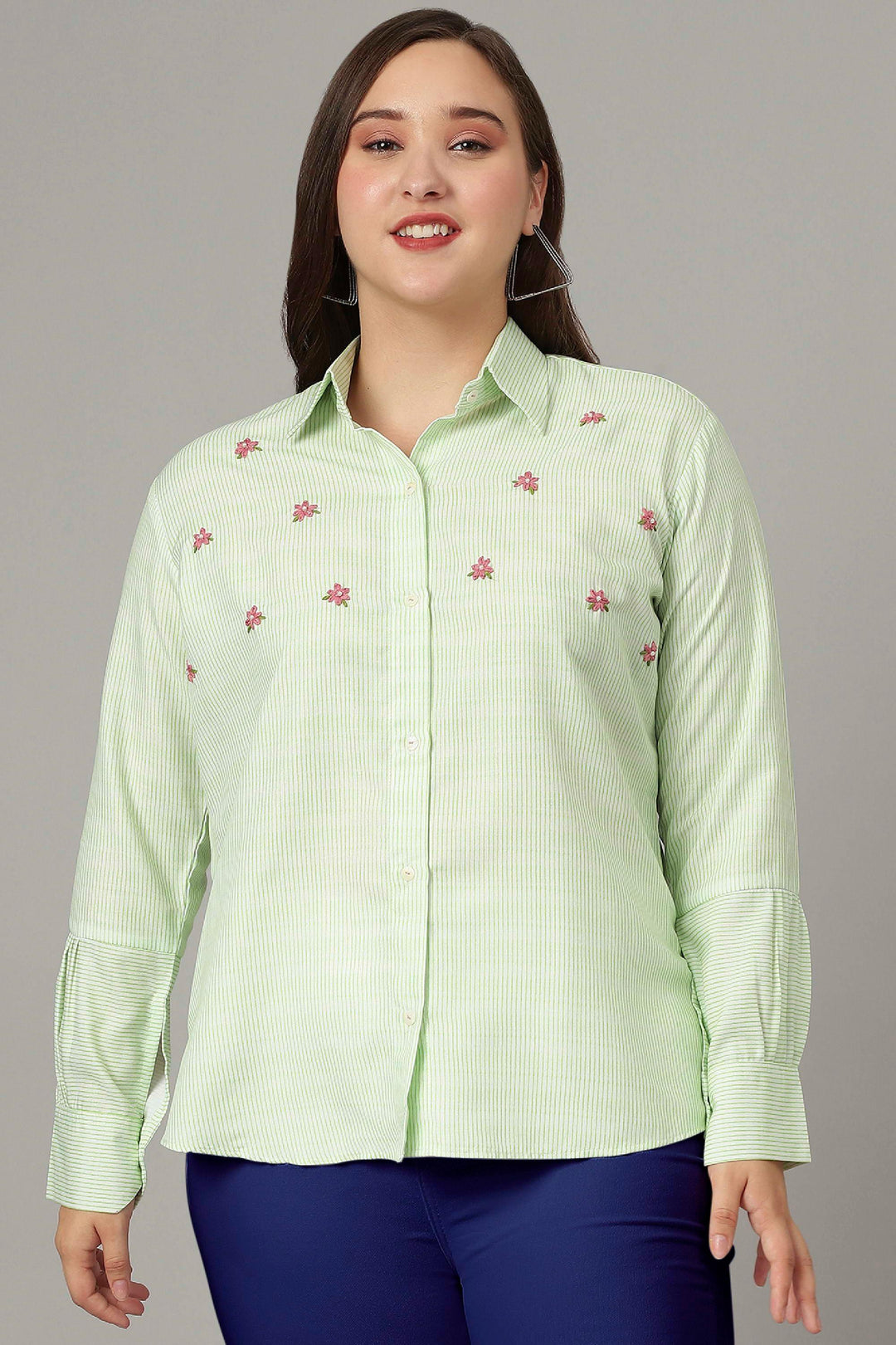 Stylish pista green striped top with long cuff sleeves for a trendy women's wardrobe.