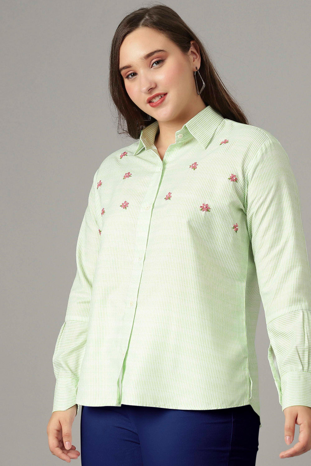 Stylish pista green striped top with long cuff sleeves for a trendy women's wardrobe.