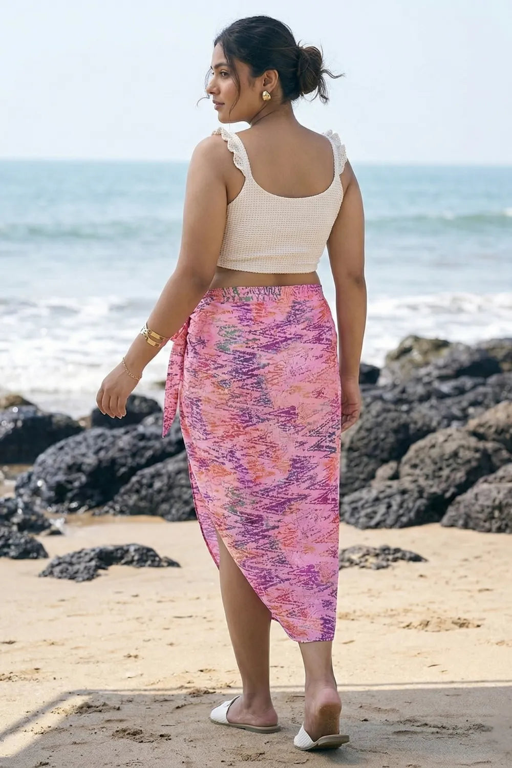 Pretty pink bikini coverup sarong with an off-white top