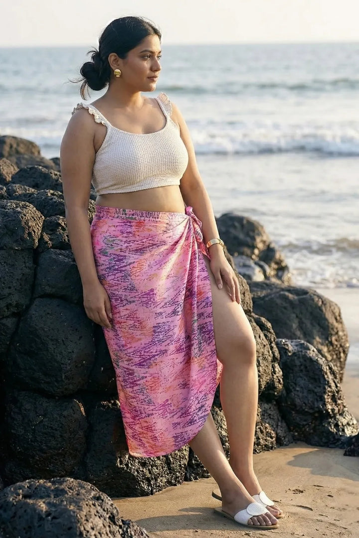 Pretty pink bikini coverup sarong with an off-white top