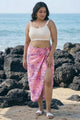 Pretty pink bikini coverup sarong with an off-white top