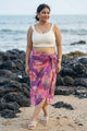 Floral pink sarong wrap skirt with an off-white crop top