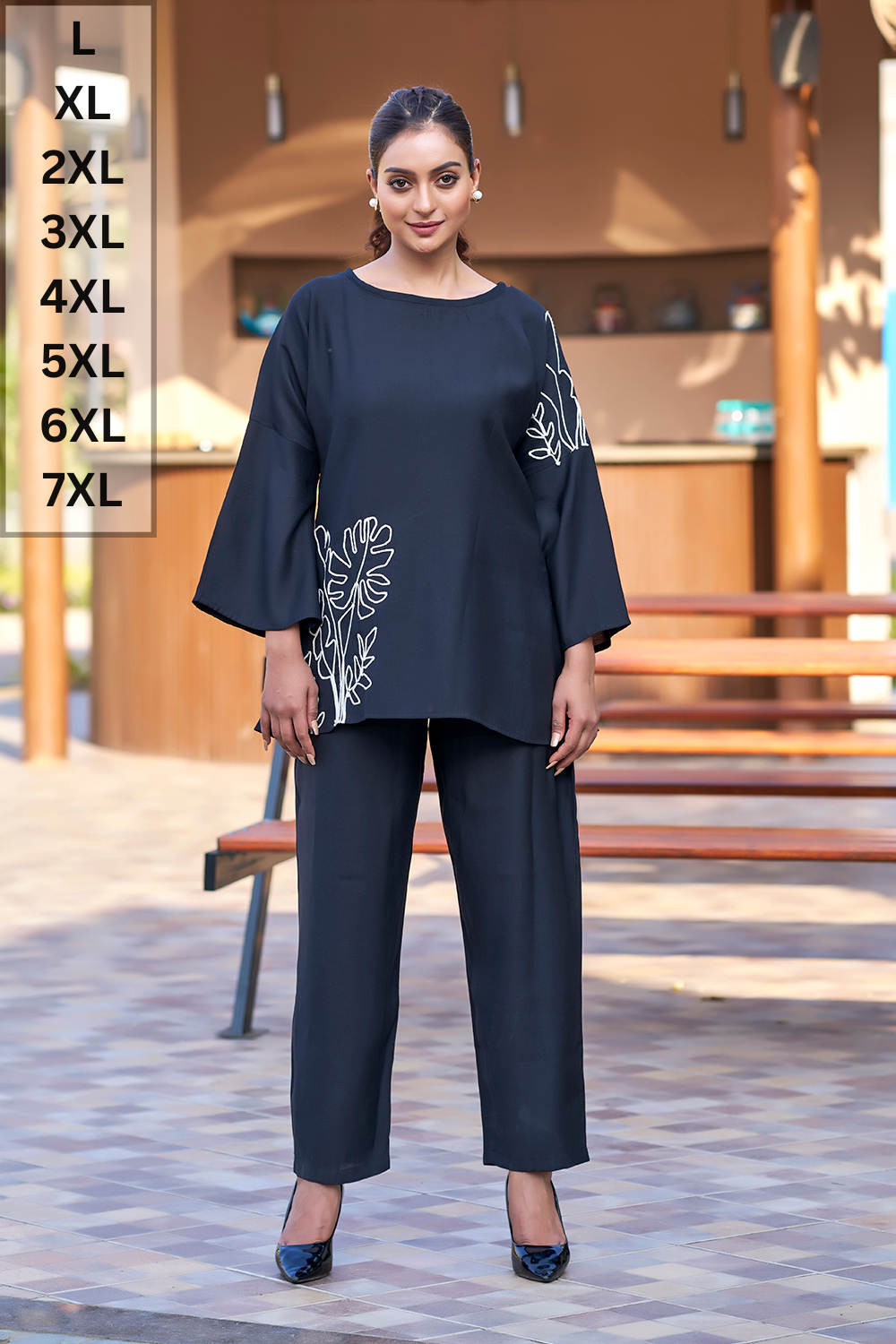 Black designer resort wear co-ord with white embroidery