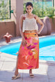 Curvylane's sheer coverup top with an abstract orange sarong